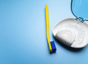 Aligner in case with toothbrush