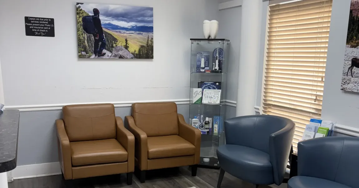 Waiting room with armchairs at Premier Dentistry of the Palm Beaches